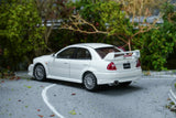 Mitsubishi Lancer Evolution VI GSR (Scotia White) - MotorHelix - 1:64 Modellauto 1/64