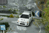 Mitsubishi Lancer Evolution V GSR (Scotia White) - MotorHelix - 1:64 Modellauto 1/64