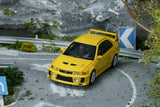 Mitsubishi Lancer Evolution V GSR (Dandelion Yellow) - MotorHelix - 1:64 Modellauto 1/64