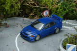 Mitsubishi Lancer Evolution VI GSR (Issel Blue Pearl) - MotorHelix - 1:64 Modellauto 1/64
