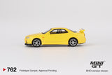 Nissan Skyline GT-R (R34) V-Spec (RHD) (Lightning Yellow) - MINI GT - 1:64