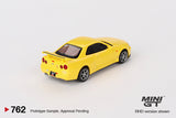 Nissan Skyline GT-R (R34) V-Spec (RHD) (Lightning Yellow) - MINI GT - 1:64