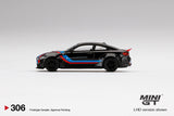 LB WORKS BMW M4 Black with M Stripe (LHD) - MINI GT - 1:64 - Modelcars Passion